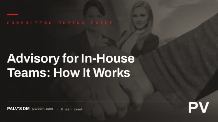 Two people shaking hands across a desk in an office, representing an SEO advisory retainer for in-house teams