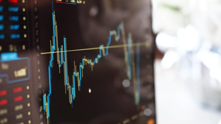 Line and bar growth charts on a screen representing customer lifetime value trending upward over time