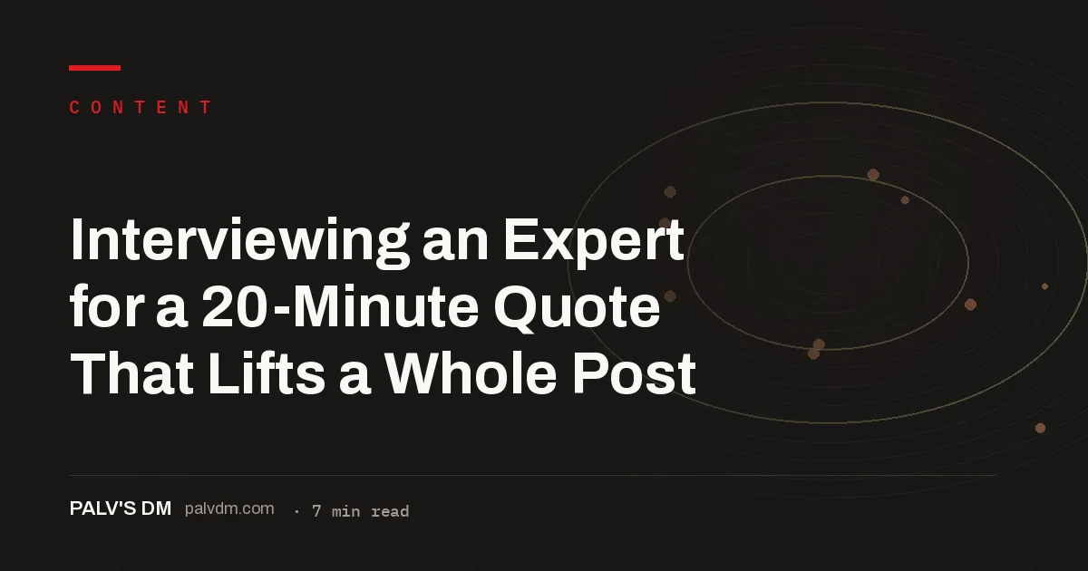 Minimal desk workspace with laptop and notebook representing an expert interview for content research