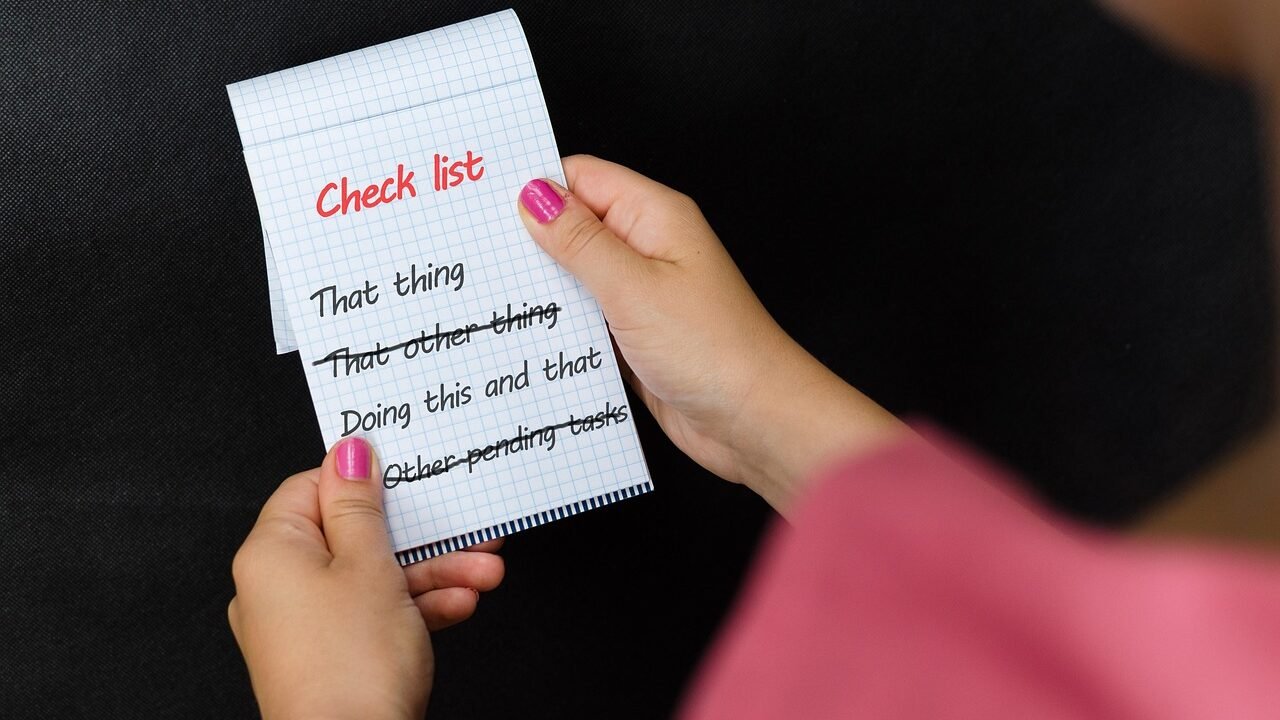 A checklist notepad representing the questions to work through before hiring an SEO agency