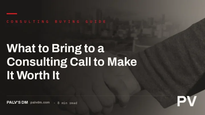 Two professionals shaking hands across a table before an SEO consulting call