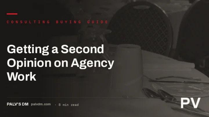 A calm business handshake in an office, representing an independent second opinion on agency SEO work